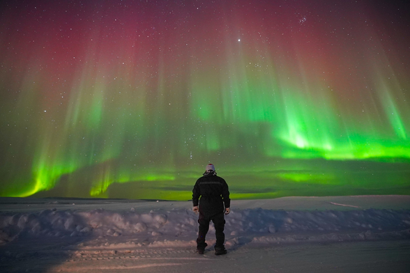 What I call colorful swirling curtains of light so close it feels you can touch them. This is in Canada about 1100 miles from Alaska. They are green, red and HUGE.