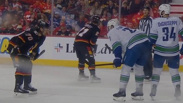 🥊 Gloves Drop 🥊 in the 2nd Between Flames & Canucks