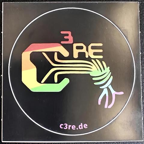 runder Sticker mit einem Regenbogen Logo des Chaosknotens vom Chaostreff Recklinghausen