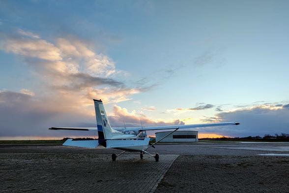 A Cessna C 172 parked on the apron