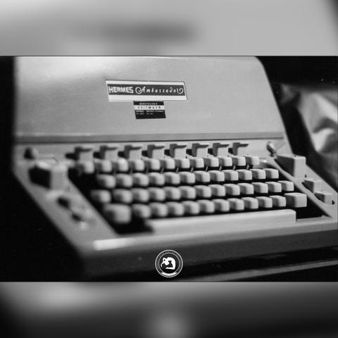 Black and white close-up photo of Hermes Ambassador typewriter front.