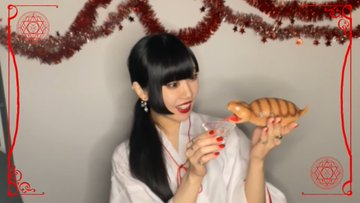 Shrine maiden Hima give a funny plastic snake a sip of sake