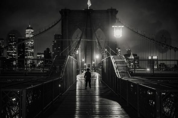 Brooklyn Bridge
New York City, September 2024

To enjoy the 140-year-old Brooklyn Bridge without the crowds and the ridiculously bright LED lightning of the towers, I only had one option: be there at 5am. The atmosphere is much more impressive when it's dark, and apart from the occasional jogger, like this Chinese lady, you have the bridge to yourself.
Two hours later the pedestrian walkway was again filled with 'early' visitors...


All of my photographs are under copyright ©. None of these photographs may be reproduced and/or used in any way without my permission.
 
© NGimages / Nico Geerlings Photography