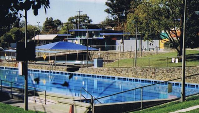 The Greensborough outdoor pool. Olympic sized, I swam most of my youth here. From Prep to the end of High School. 

source https://www.flickr.com/photos/bootload/albums/72157706074401655/with/4483040153