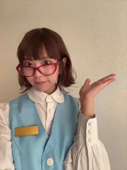 Urapico looking over a pair of glasses