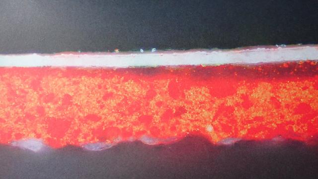 Sample with a white layer over a vibrant red one speckled with golden orange, and I think a very thin layer of gold leaf at the top? - from an English painting dated 1335, described as a gold leaf layer using vermilion to depict gilded red.