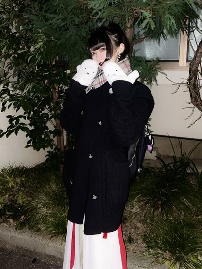 Himari in a heavy winter coat and cute white mittens with little faces on them
