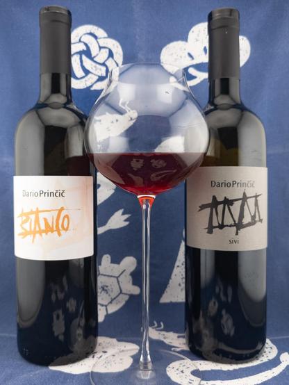 Two wine bottles and wine glass