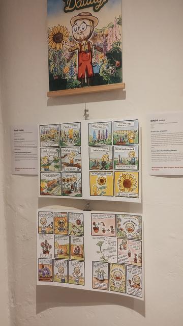 Artwork by Scottish creator Neil Slorance on the exhibition wall of La Belle Adventure
