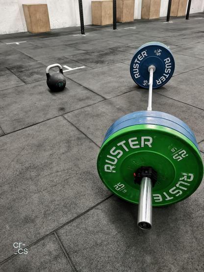 Dumbbell and Barbell in a crossfit gym