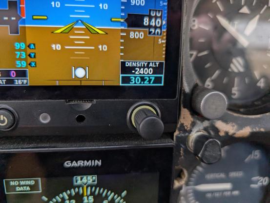 Close up of G5 avionic on a small aircraft. The density altitude is shown as -2400 on the display.