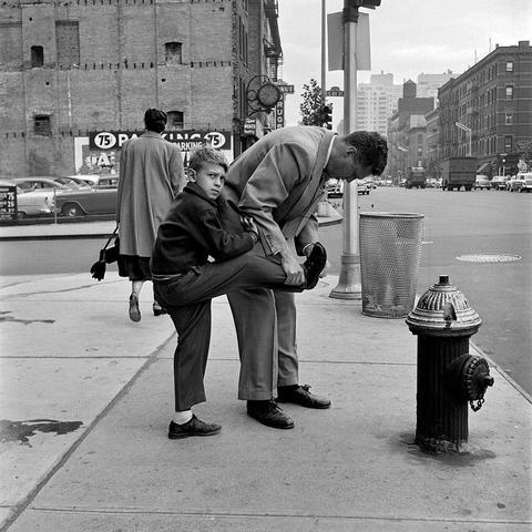 Vivian Maier, taking pictures in her free hours as nanny in New York in the 1950's
