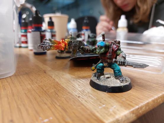 Orc Commando firing scatter shot from a gun