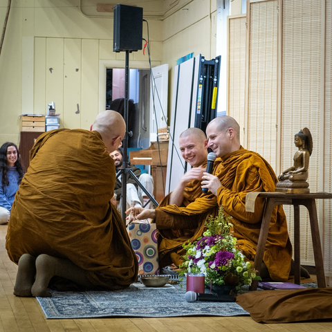 Bhante Jāgaro receiving gifts from Ajahn Kovilo and Ajahn Nisabho.