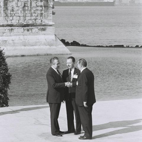 Arrival of Mário Soares, Portuguese Prime Minister, Jacques Delors, President of the CEC, and Lorenzo Natali, Vice-President of the CEC in charge of Cooperation and Development and Enlargement (from left to right) shaking hands.