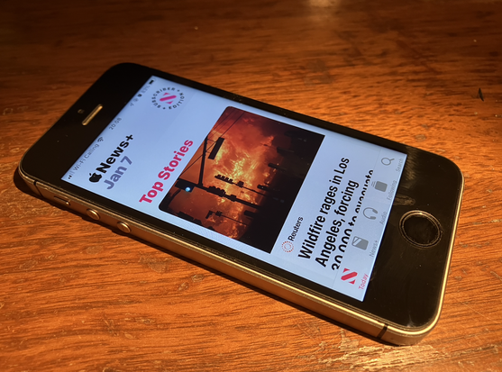 A photo of my nearly 8 year old iPhone SE, defiantly working great after all this time (on its third battery).