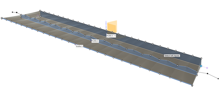 A CAD screen capture shows a loft operation in progress.  The front and rear edges of the ramp are rectangles.  The middle of the ramp is a rectangle where the top edge has been replaced with a shallow sawtooth pattern.  The edges of the sawtooth correspond to the vertical columns in the printed piece's herringbone.