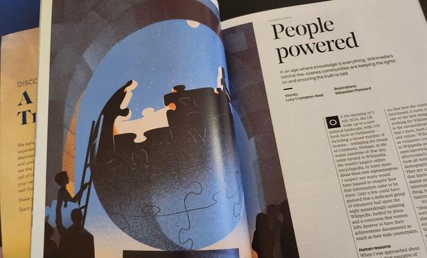 Photograph of the printed RSA article, which is linked in the post, showing an illustration of the Wikipedia logo being built by people