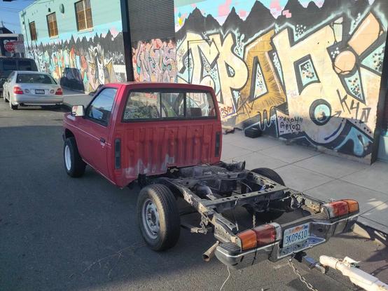 Another shot from the rear, showing the stripped chassis of the truck.