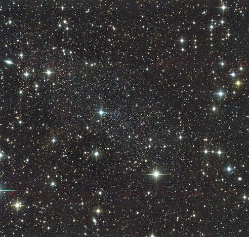 Astrophotography image by Giuseppe Donatiello. The image has a black background with numerous stars of various hues from white to blue to orange   across the entire image.