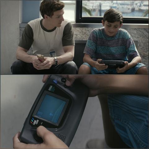 Two screenshots from the 4th episode of season 1 of Dexter Original Sin, showing Dexter sitting next to a kid playing Sonic The Hedgehog on a Sega Game Gear, with a close up shot on the handheld console in the second screen.