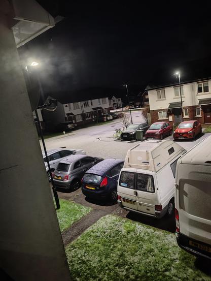 Light dusting of snow/hail across the road