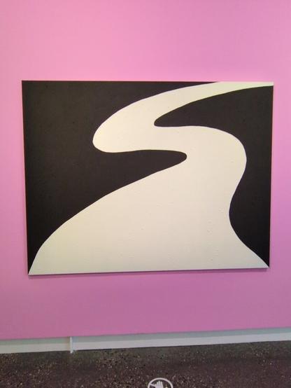 A Matthew Harris painting titled "Exodus". Against a pink wall, on a black canvas, a thick white line in the shape of the letter S snakes its way up the canvas, suggesting a path or a river.