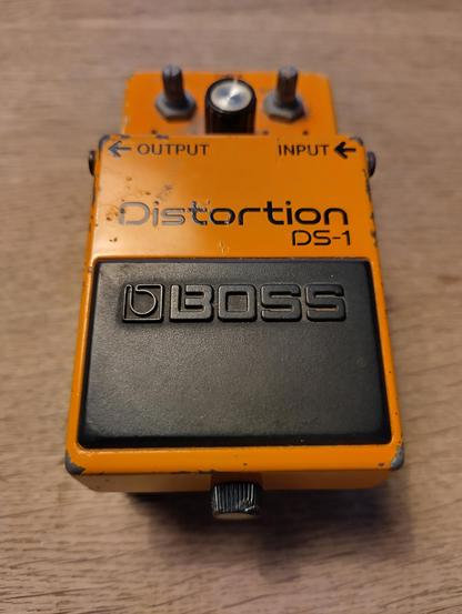 Photo of a Boss DS-1 guitar effect. Now this one looks heavily used, love it!