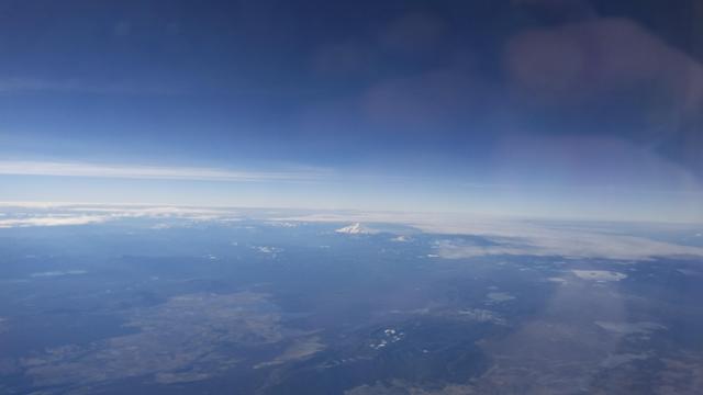 A picture of Mount Shasta (California) seen from an airplane window
