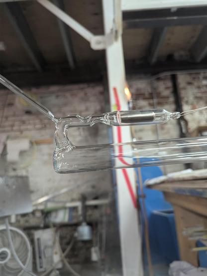 The fancy Europeanesque electrode prep for the 25mm crackle tube. I used the recycled free electrodes so I side tubulated. I really like the corner side tube. These new vigoreaux (not sure how they are spelled) are much easier to make. They are designed to keep the fill glass away from the electrodes.