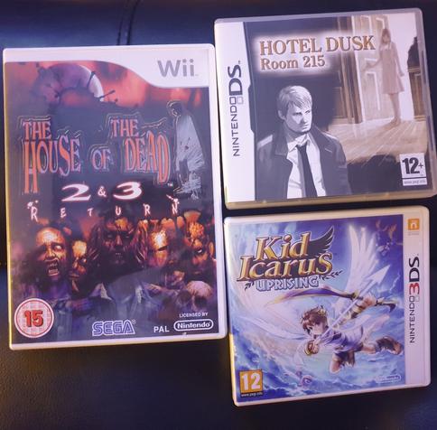 A selection of cutting-edge video game software.

The House of the Dead 2 & 3 Return (Sega, 2008, Nintendo Wii) a remake of Sega's light gun classics.

Hotel Dusk: Room 215 (Cing, 2007, Nintendo DS) a moody point-and-click mystery adventure.

Kid Icarus Uprising (Sora Ltd., 2012, Nintendo 3DS) a rail shooter/action adventure hybrid made as a successor to the 1987 NES platformer.