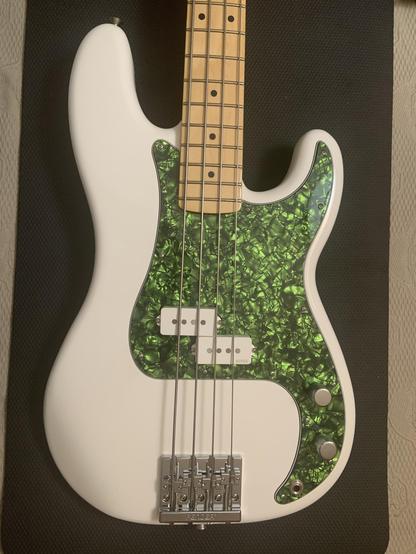 After pic of my white, Made in Mexico Fender Player Precision Bass, now with white EMG GZR Geezer Butler pickup and Lime Green Pearl pickguard from WD Music.
