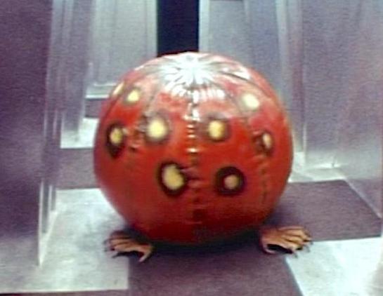 The "Alien" from the movie Dark Star... basically a beach ball with spots painted on it and two clawed feet underneath.