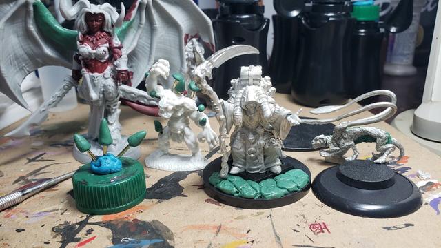 Bare mostly unprimed minis with greenstuff as described in the post