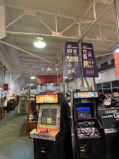 Musée Mécanique's many machines. Up front are machines of Tetris (Atari) and Pole Position.