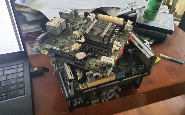 Three Supermicro A1SAI-2750F motherboards, two in mini-ITX DIN-rail mount cases.