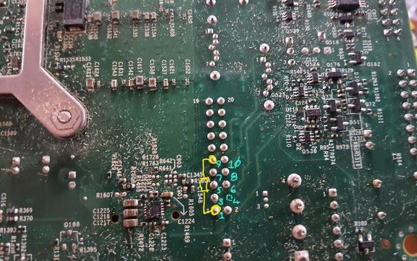 Underside of the PCB where header JTPM1 lives, showing where I plan to install said 100ohm resistor.