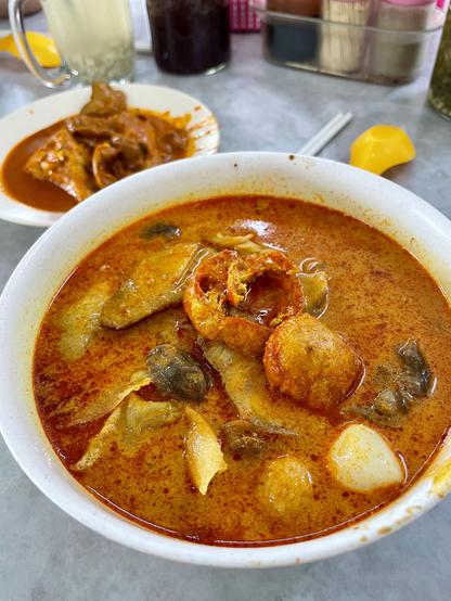 A bowl of curry laksa