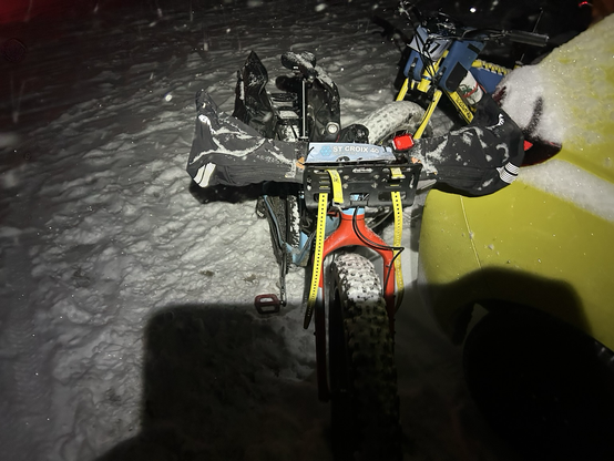 A heavily loaded fat tire bike in winter conditions.