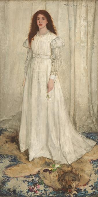James McNeill Whistler (1834–1903): Symphony in White, No. 1: The White Girl (1862), portrait of Joanna Hiffernan, oil on canvas, 83.8x42.4 in (213x107.9 cm), National Gallery of Art, Washington, DC.  

Description from the website: “ A young woman with pale, peachy skin, wearing a long, flowing white dress, stands in front of a white curtain in this vertical portrait painting. Her auburn-red hair cascades down over and behind her shoulders. She looks to our left with green eyes, and her pink, full lips are closed. Her dress has puffed shoulders above a white-on-white striped pattern on the long sleeves. She stands on an animal pelt; it is not clear whether it is a wolf or a bear. The pelt spans the width of the painting and overlaps a blue patterned carpet. The animal’s mouth gapes to show sharp teeth. Its glassy eyes are wide open, and it seems to look at us. The edges of the animal skin are red. The woman holds a white lily by her side in her left hand, while yellow and purple flowers lie scattered on the pelt.”