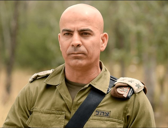 Photo of a bald man in an Israeli military uniform
