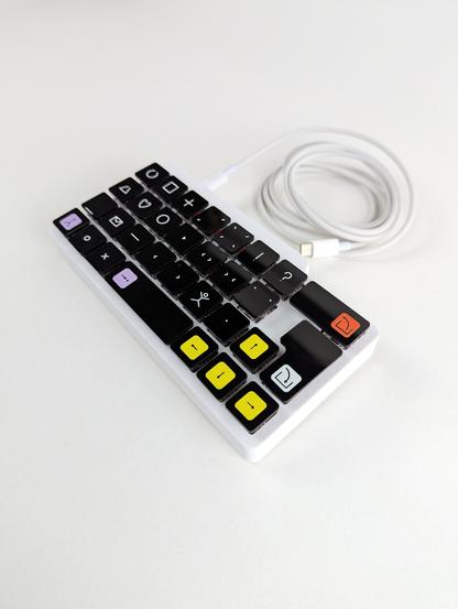 View from the side. As all the keys have symbols on it, keys with functions have colors to avoid misunderstanding.
