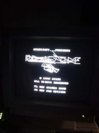 Corrupt title screen . "Battlezone" has weird random lines through it and the tank is a pile of random triangles.