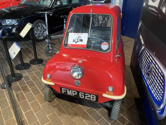 Red 1960 Peel P50, frontal view