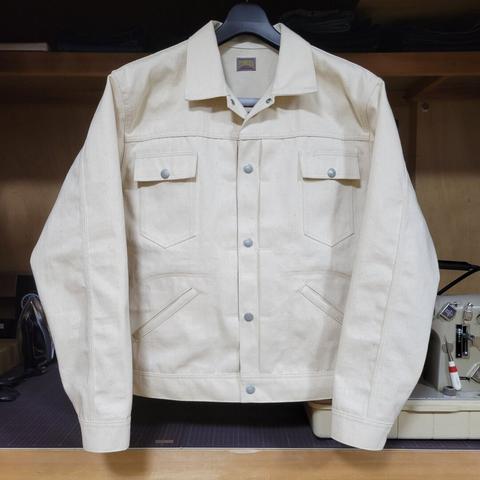 front view of an off-white sateen jacket