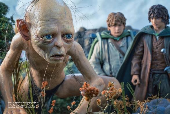 Gollum leads Frodo and Sam through the marshes. Frodo looks down and Sam looks at Gollum looking concerned