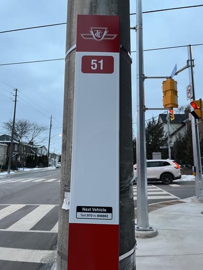 TTC bus stop sign with route 51 listed.
