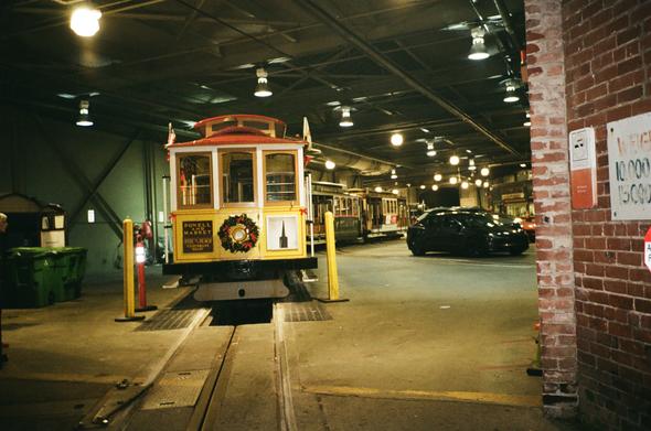 cable car barn.  there's an xmas wreath on a cable car