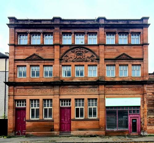 A red sandstone Edwardian public baths and wash house.