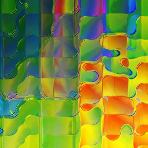 Random 2017 12 #52. Abstract wave pattern in blue, green, red and yellow, reminiscent of translucent plastic. Computer-generated illustration from a Photoshop automation, programmed by Stefan Romero Grieser.